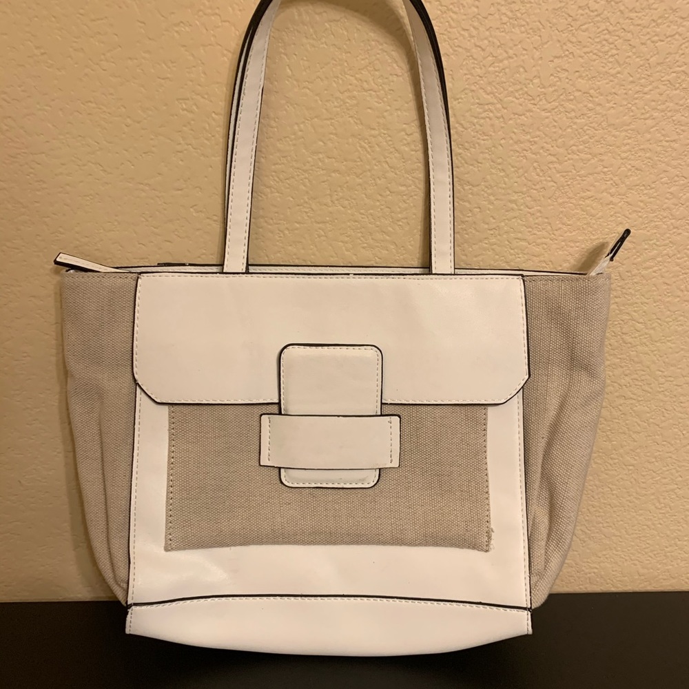 White and tan purse